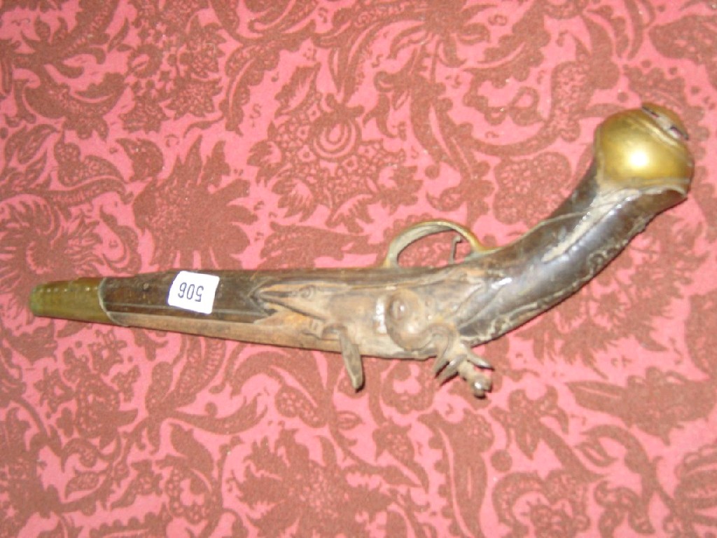 Appraisal: A Georgian walnut flint lock pistol with later Indian repairs