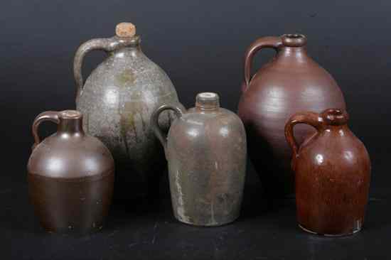 Appraisal: FIVE AMERICAN STONEWARE JUGS - in to in high