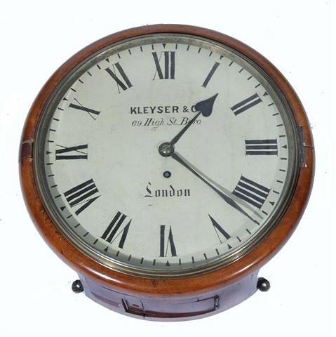 Appraisal: A VICTORIAN MAHOGANY CASED CIRCULAR WALL CLOCK having a single