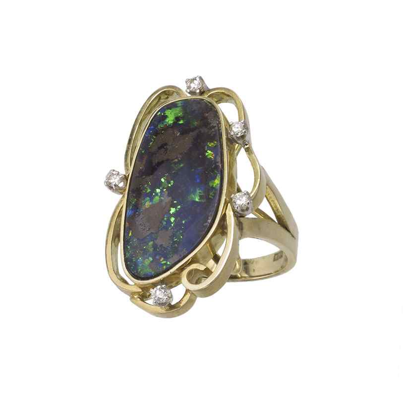 Appraisal: K DIAMOND BOULDER OPAL RING K yellow gold ring contains