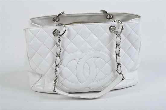 Appraisal: CHANEL WHITE QUILTED LEATHER BAG One side with Chanel CC