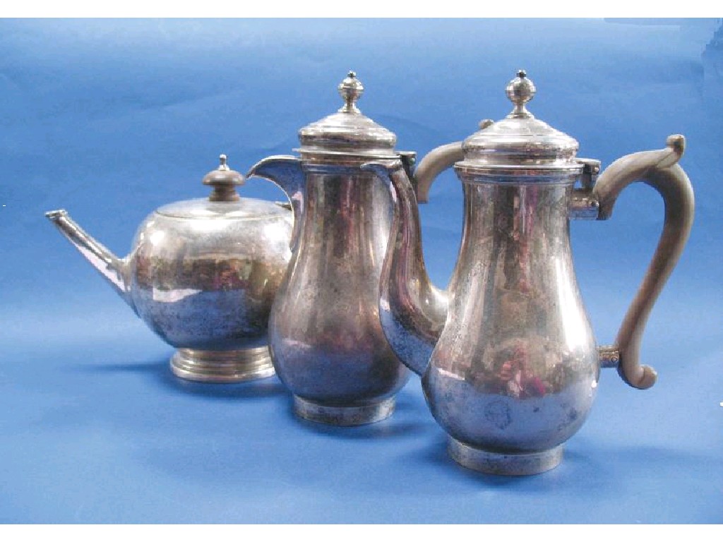 Appraisal: AN IRISH TEAPOT of bullet form with a flush-hinged cover