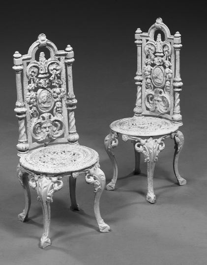 Appraisal: Pair of Victorian-Style Cast-Iron Garden Chairs each with a domed