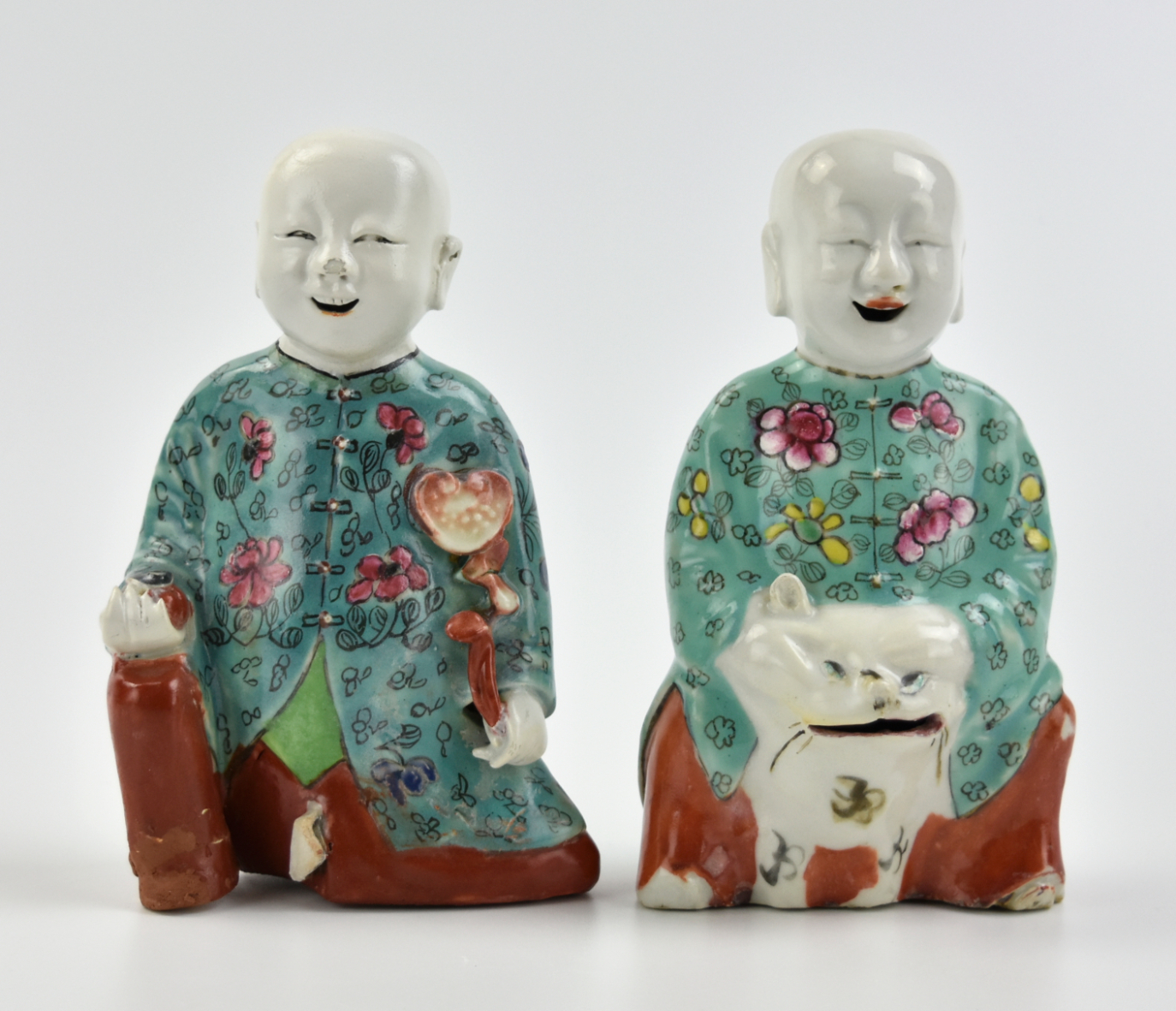 Appraisal: Chinese th C a pair of bold child figures in