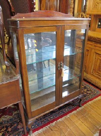 Appraisal: CABRIOLE LEG TWO DOOR GLAZED DISPLAY CABINET