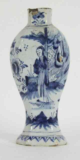 Appraisal: A Dutch Delft blue and white baluster vase with canted