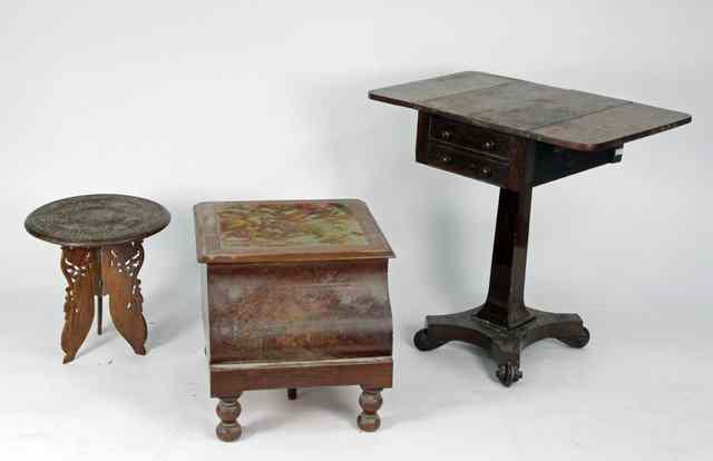 Appraisal: A Regency rosewood two-flap work table fitted two drawers on