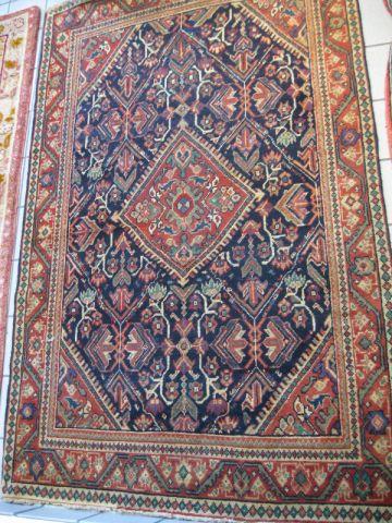 Appraisal: Mahal Persian Handmade Rug fancy geometric floral on indigio field