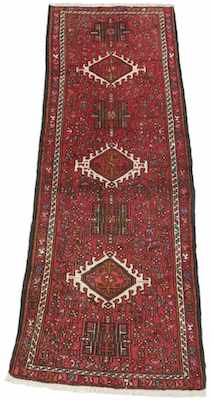 Appraisal: A Persian Heriz Runner Apprx '- x '- Medium-low wool