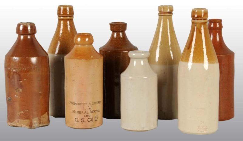 Appraisal: Lot of Stoneware Bottles Description One has a few chips