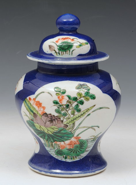 Appraisal: A CHINESE PORCELAIN BALUSTER VASE and cover with powder blue