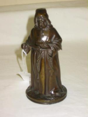 Appraisal: A BRONZE FIGURAL VESTA CASE modelled as a monk in