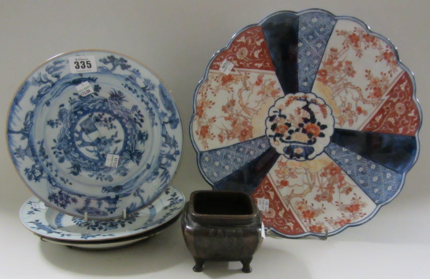 Appraisal: Three Chinese export blue and white plates th century painted