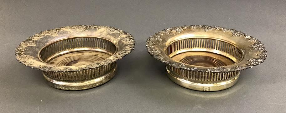 Appraisal: Pair of English Silver Wine Coasters Pair of English silver