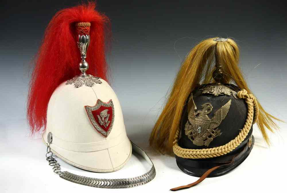 Appraisal: MILITARY FRATERNAL HELMETS - Including US Army M th Cavalry