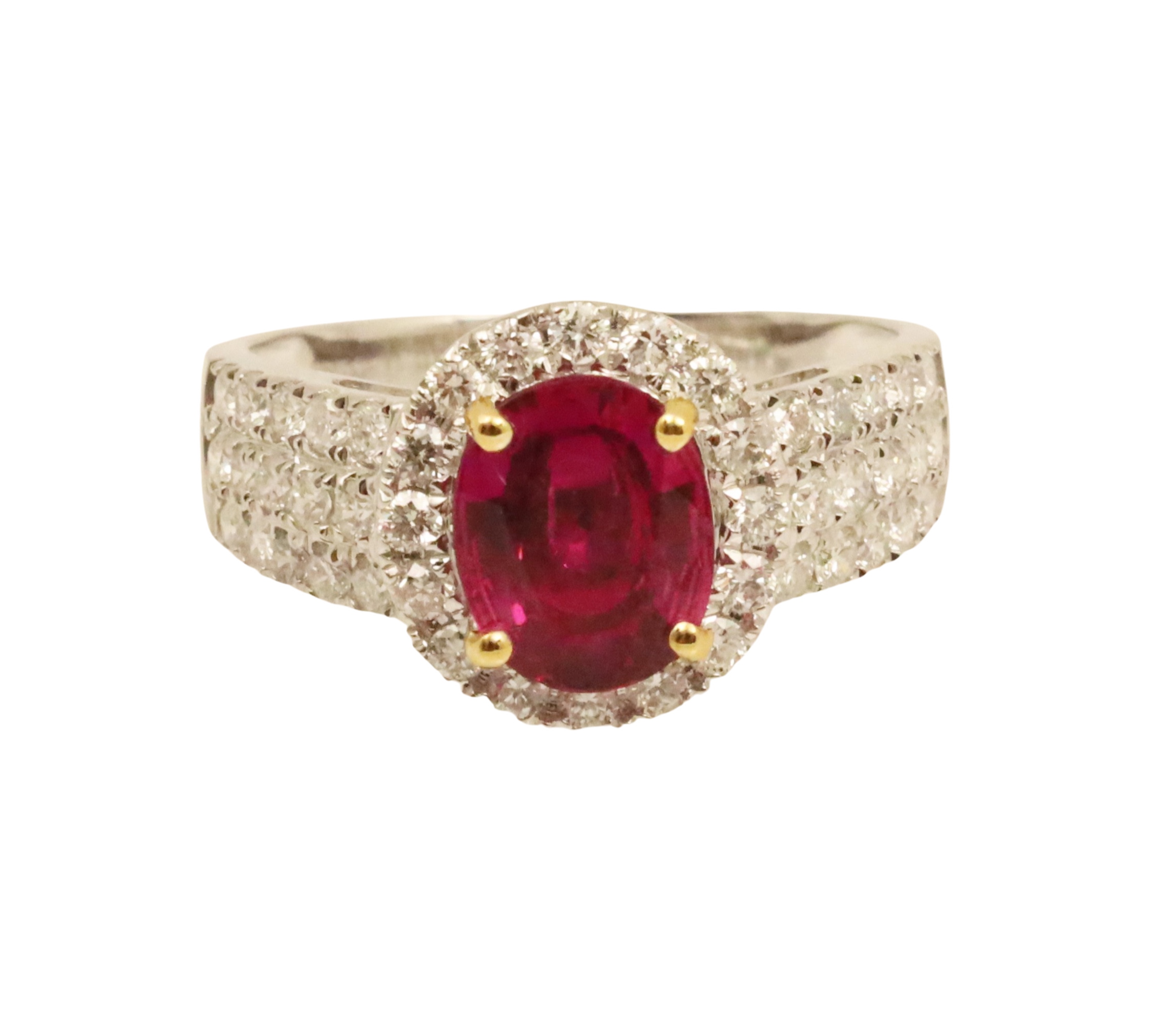 Appraisal: K two tone gold ruby and diamond ring having center