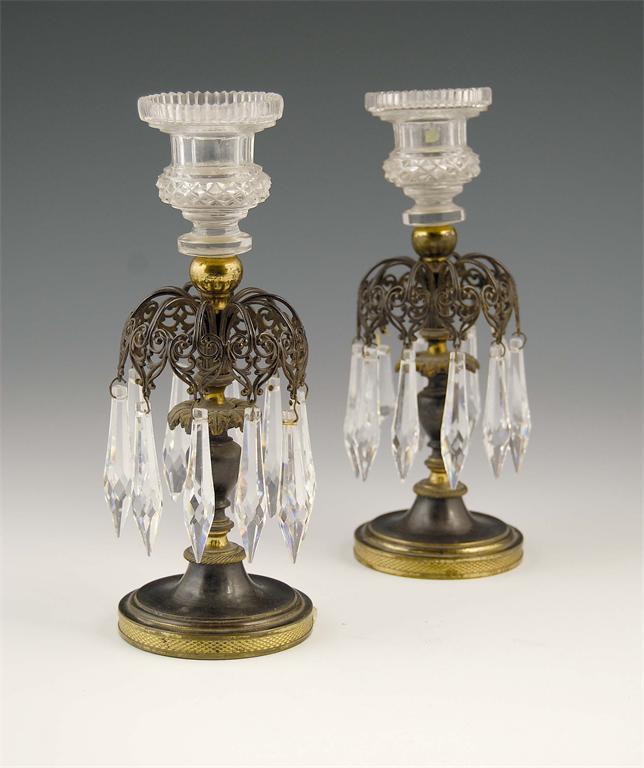 Appraisal: A pair of th century ormolu candlesticks lustres