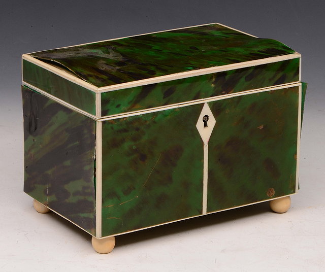 Appraisal: AN ANTIQUE GREEN STAINED TORTOISESHELL AND IVORY TEA CADDY the