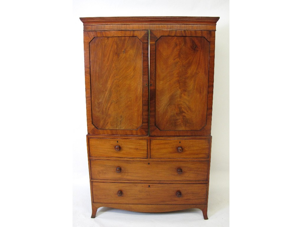 Appraisal: A George IV mahogany linen press with a plain cornice