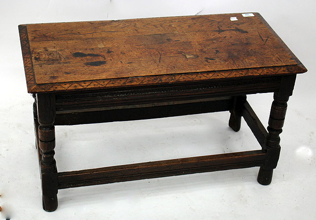 Appraisal: A RECTANGULAR OAK LOW OCCASIONAL TABLE of th century style