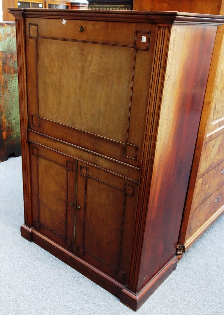 Appraisal: A th century mahogany secr taire abattant in the manner