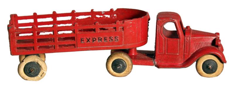 Appraisal: Tootsietoy Express Stake Truck Circa s Painted diecast with white