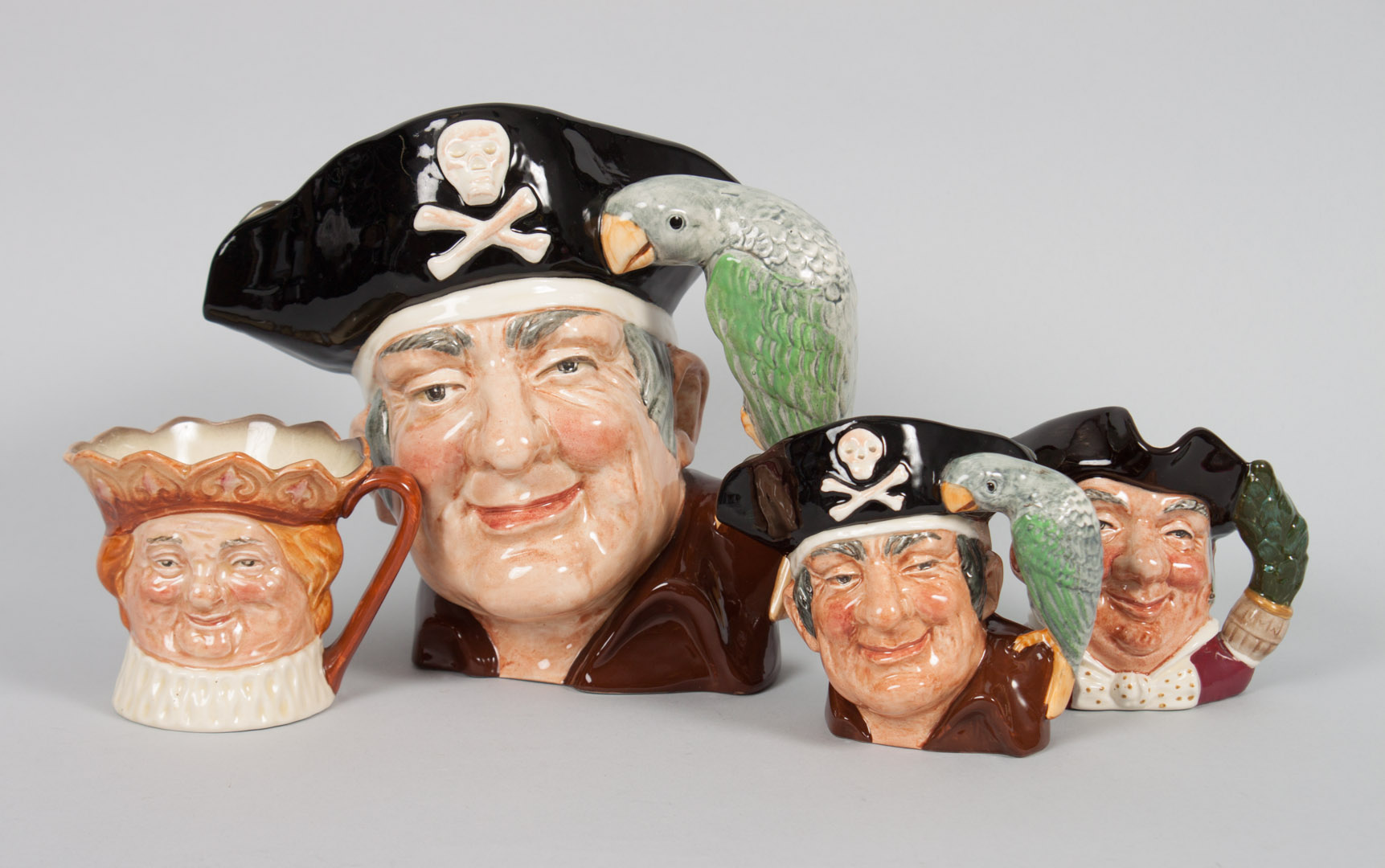 Appraisal: Four Royal Doulton china character jugs including Long John Silver