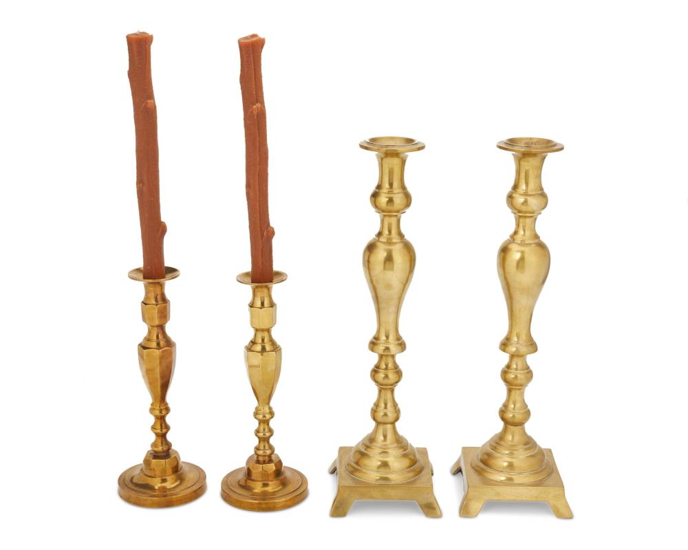 Appraisal: A group of brass candlesticks th century Comprising two matching