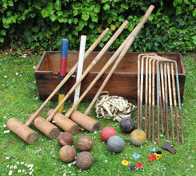 Appraisal: AN OLD CROQUET SET in a pine box with four