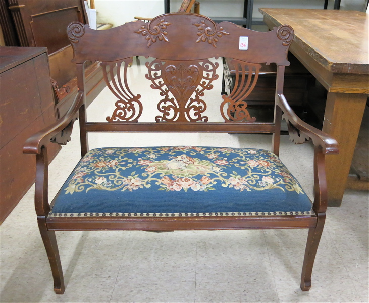 Appraisal: LATE VICTORIAN MAHOGANY SETTEE American c having a carved and