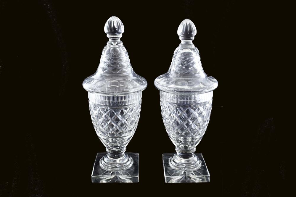 Appraisal: PAIR OF REGENCY STYLE CUT-GLASS COVERED URNSEach diamond-cut vessel with