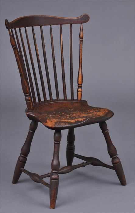 Appraisal: AMERICAN MAROON-STAINED COMB BACK WINDSOR SIDE CHAIR The top rail