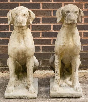 Appraisal: A pair of composition stone figures of seated dogs cm