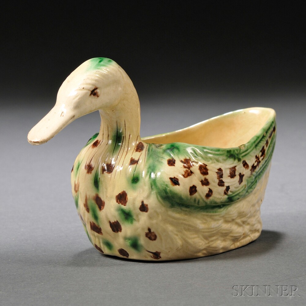 Appraisal: Staffordshire Cream-colored Earthenware Duck-form Sauceboat England c translucent green and