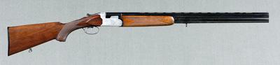 Appraisal: Sauer-Beretta shotgun ga superposed vent rib engraved receiver checkered walnut