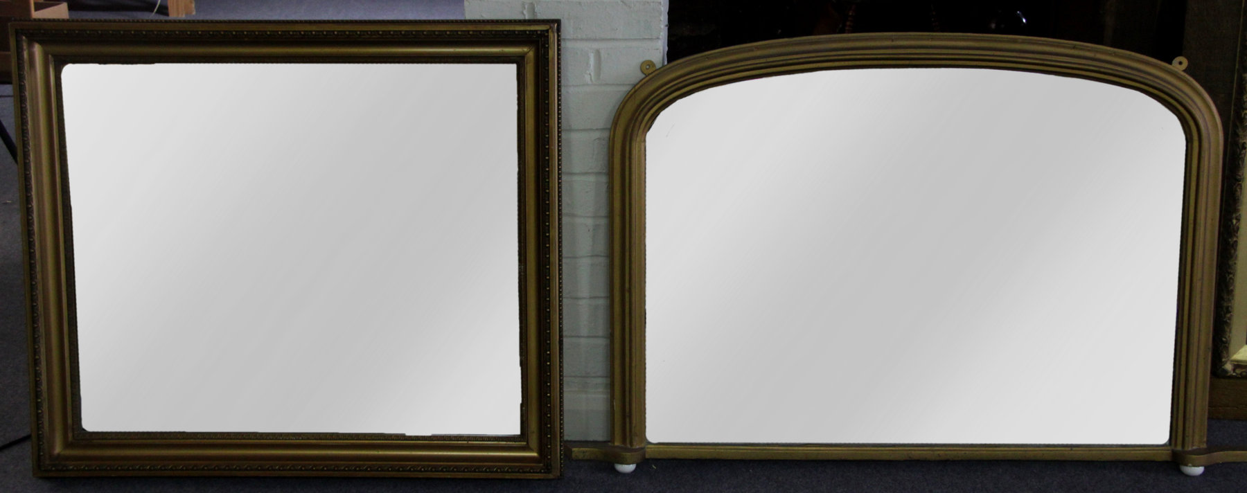 Appraisal: A rectangular wall mirror in a gilt frame the glass