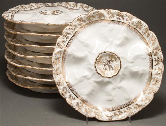 Appraisal: Set of eight Continental floral gilt decorated oyster plates late