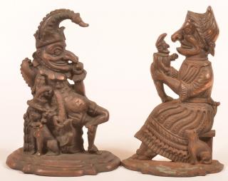 Appraisal: Cast Iron Punch and Judy Doorstops Cast Iron Bronze Finish