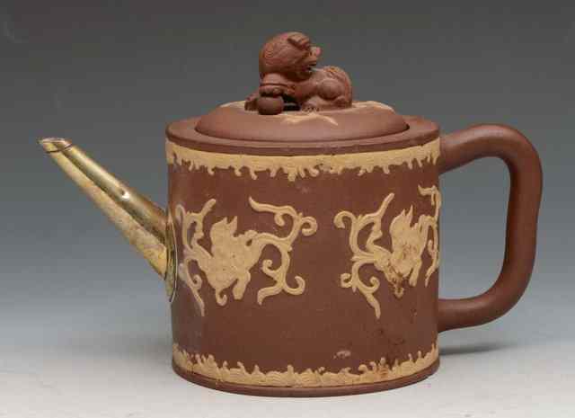 Appraisal: A CHINESE YIXING CYLINDRICAL TEAPOT and cover with kylin finial