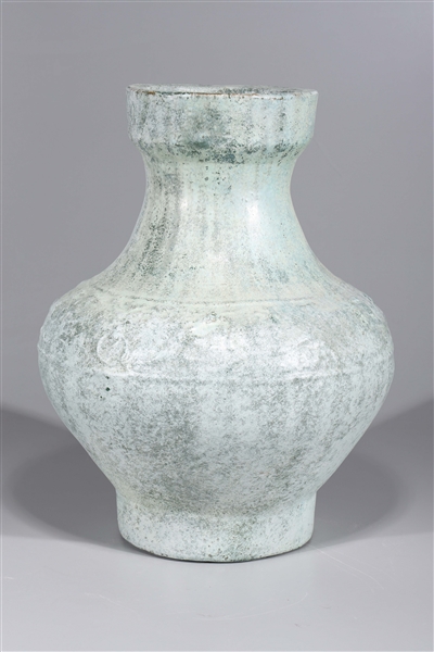 Appraisal: Chinese archaistic ceramic vase with molded designs overall good condition