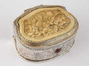 Appraisal: A Russian silver shaped rectangular box the lid with conforming