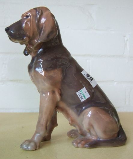 Appraisal: A Royal Copenhagen figure of a seated bloodhound No cm