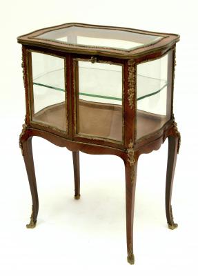 Appraisal: A FRENCH KINGWOOD AND GILT METAL VITRINE of serpentine oblong