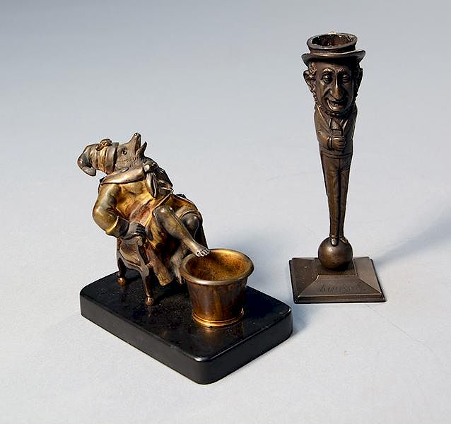 Appraisal: Two Brass Objects Two brass objects match holder with figural