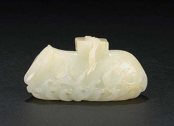 Appraisal: A white jade carving of a horse on waves Qing