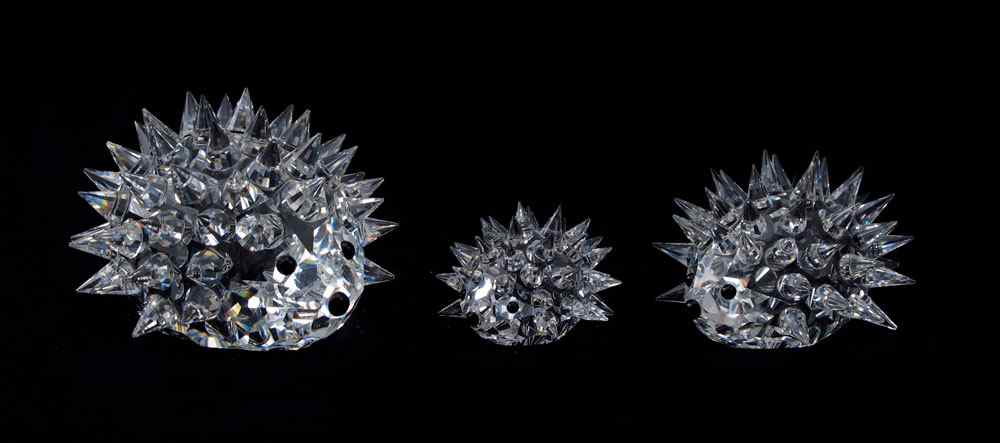 Appraisal: SWAROVSKI CRYSTAL FIGURINES By designer Max Schreck oval HEDGEHOGS -