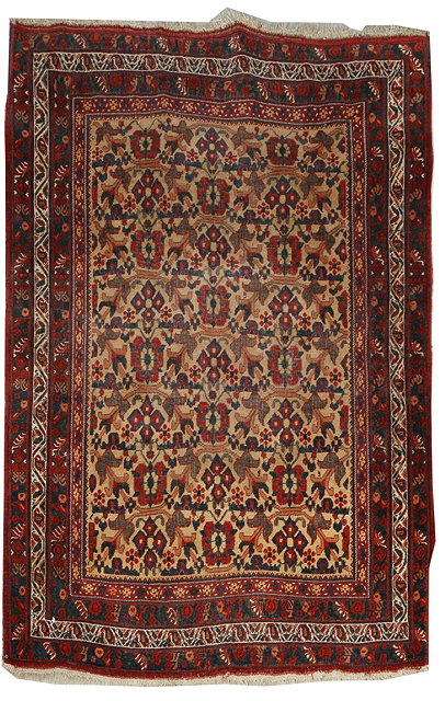 Appraisal: AN AFSHAR CAMEL GROUND RUG with interlinked rosette motif within