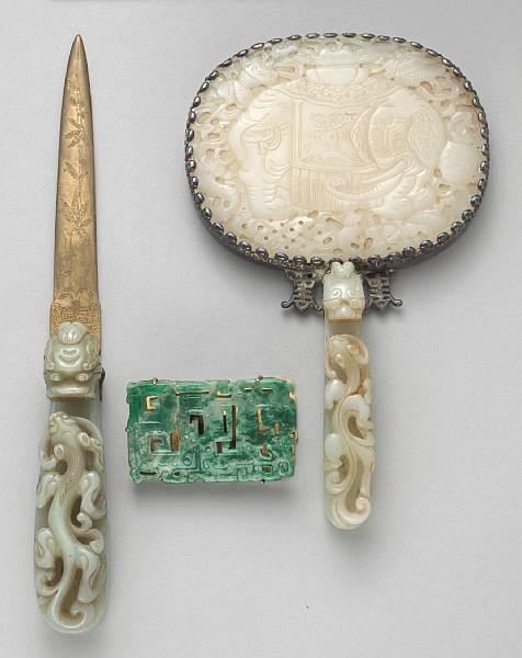 Appraisal: Three jade-mounted decorations The first a hand mirror with silver