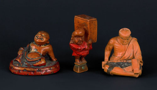 Appraisal: Three Japanese carved boxwood figural netsuke th c