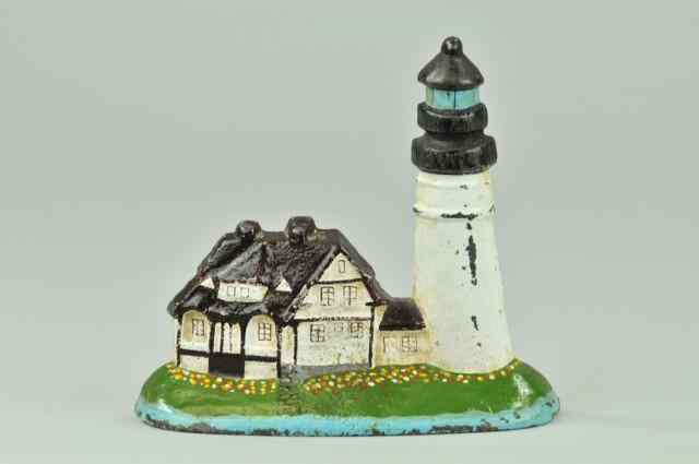 Appraisal: LIGHTHOUSE DOORSTOP Depicts white black lighthouse w keeper's home on